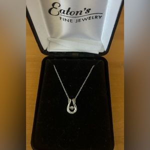 Sterling silver diamond necklace.